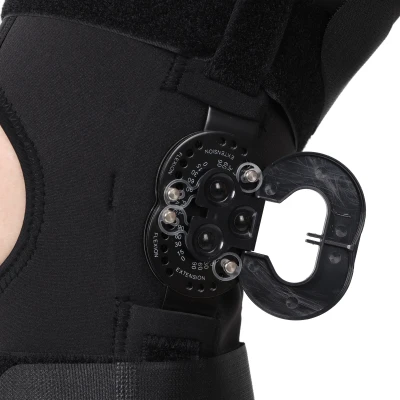 knee brace with hinges for ligament support